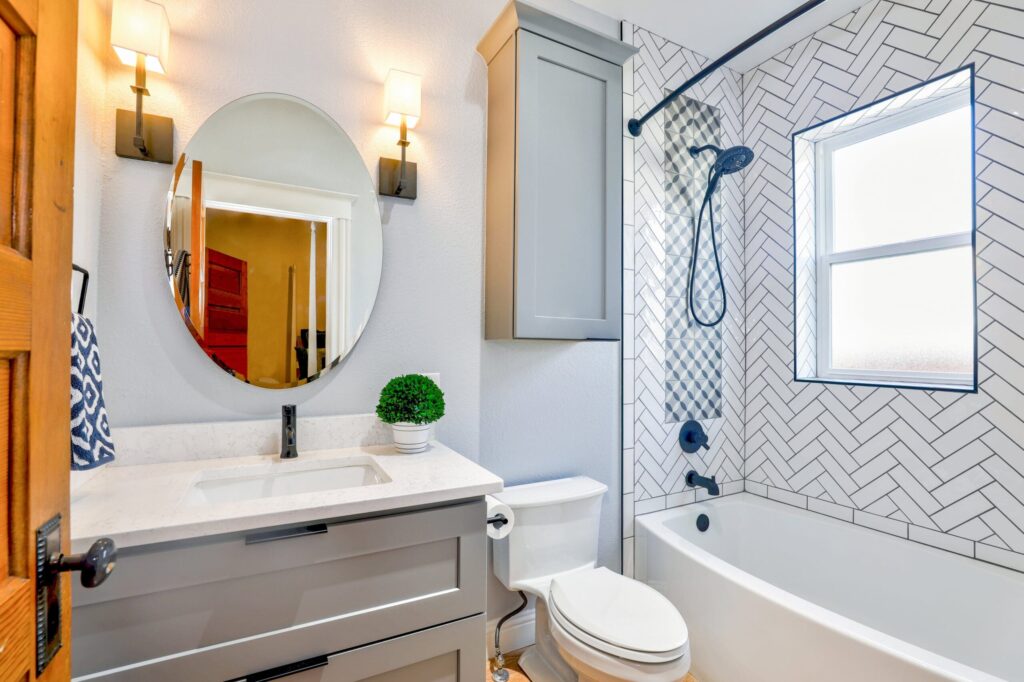 bathroom-remodel-cost Oval Mirror Near Toilet Bowl